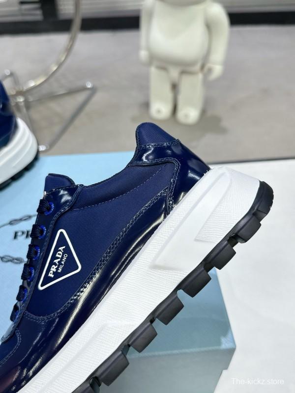 2025 Women Prada Blue Leather Sneakers KFY00310